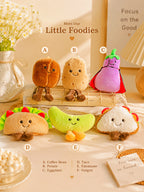 A set of six cute plush food-themed toys labeled A through F, arranged on a tabletop with decorative props. The plushies include a coffee bean, potato, eggplant, taco, banana, and onigiri.