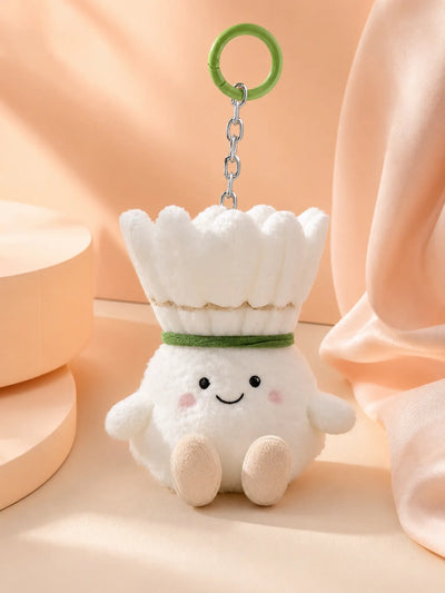 Badminton shuttlecock plush keychain in warm peach studio lighting