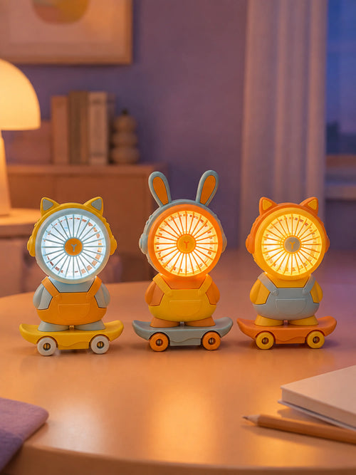 Three cute cartoon fans glowing with ambient light on a study desk