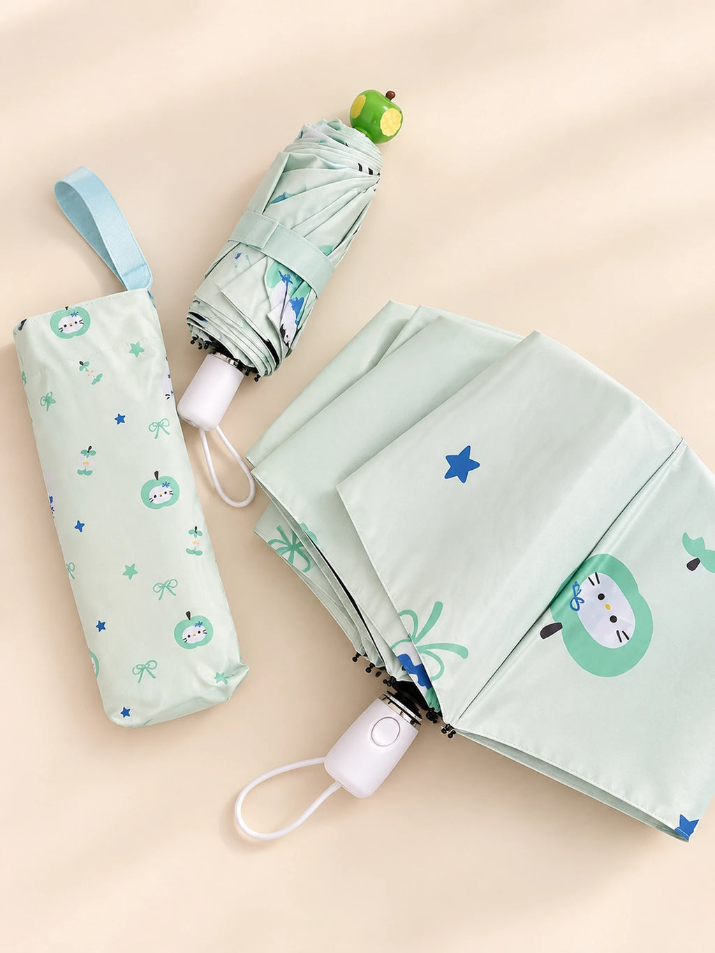 Green Apple Umbrella folded with matching sleeve and open canopy detail