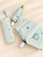 Green Apple Umbrella folded with matching sleeve and open canopy detail