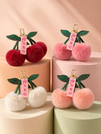 Four pom pom keychain colors in premium studio lighting