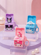 Kuromi, My Melody and Cinnamoroll handbag charms opened to reveal surprise figures