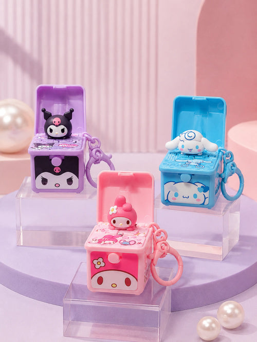 Kuromi, My Melody and Cinnamoroll handbag charms opened to reveal surprise figures